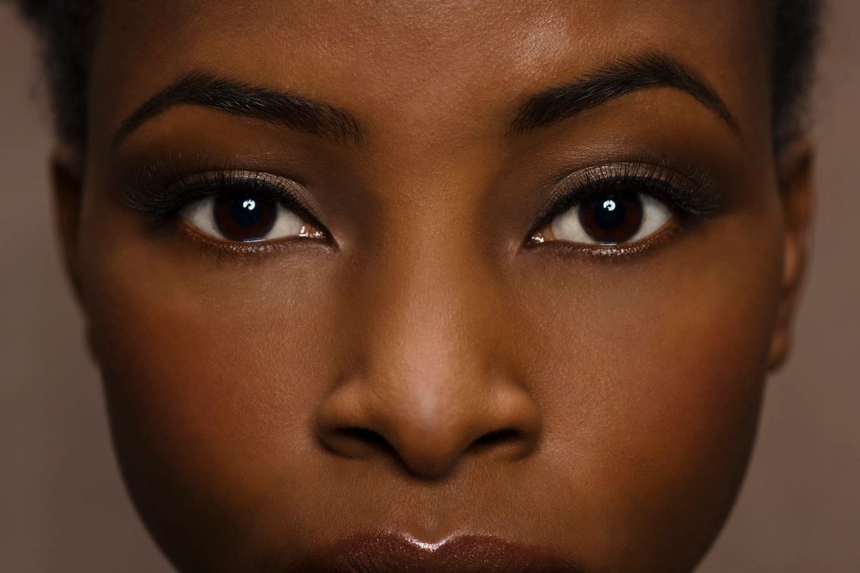 Close-up of a person's expressive eyes and nose.